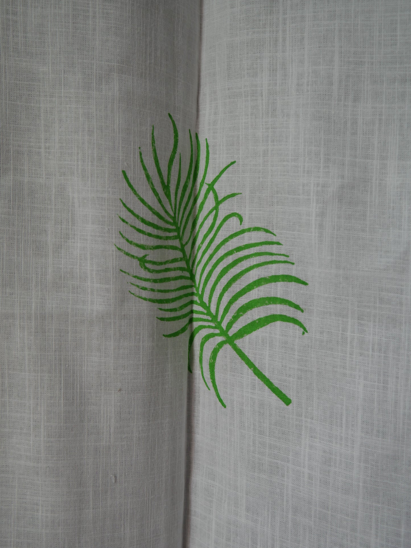 Hand block palm leaves on curtain