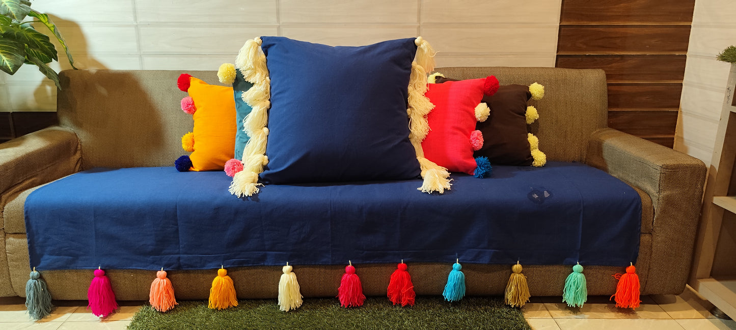 Royal Blue sofa cover with jumbo rainbow tassel
