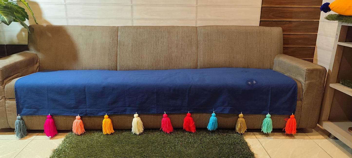 Royal Blue sofa cover with jumbo rainbow tassel