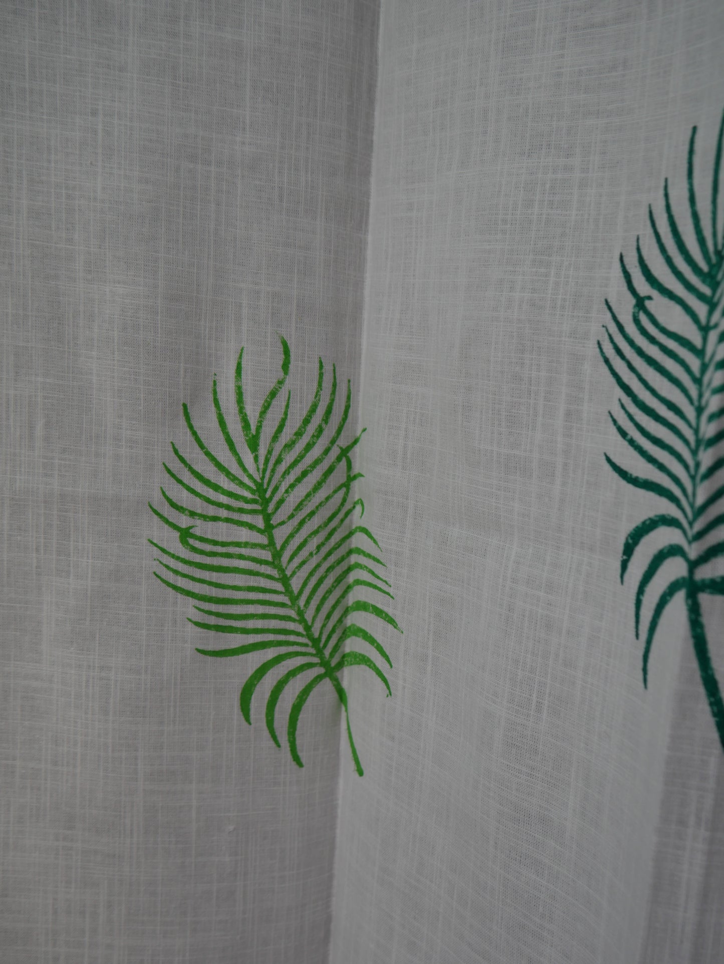 Hand block palm leaves on curtain