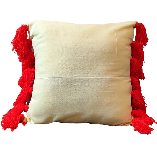 Lemon yellow cushion cover with red tassels