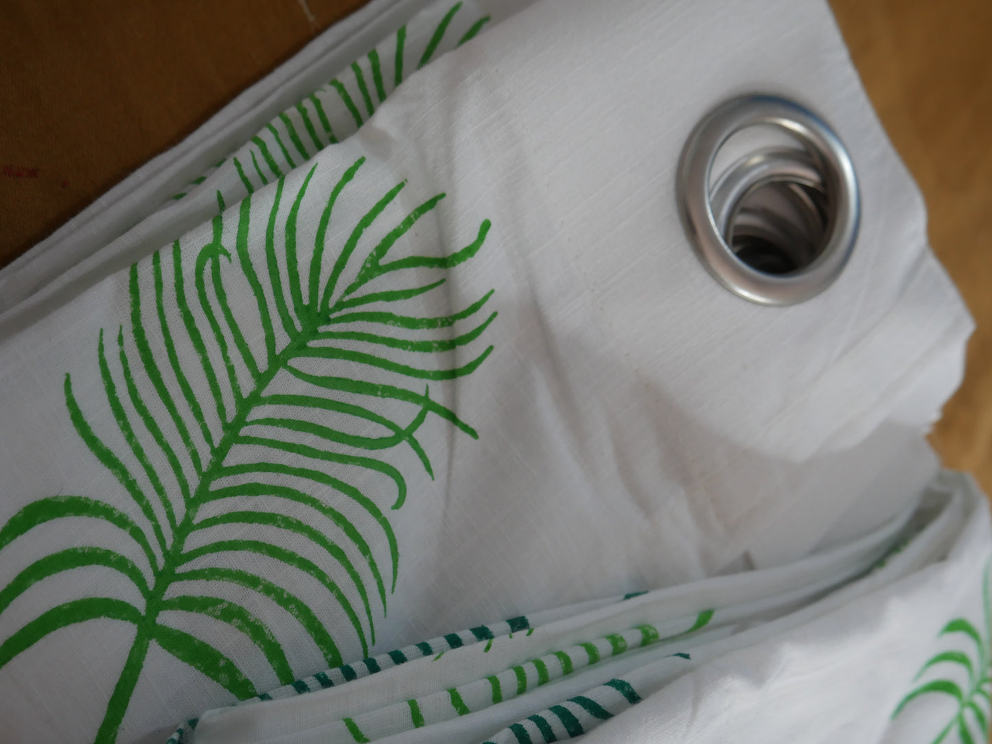 Hand block palm leaves on curtain