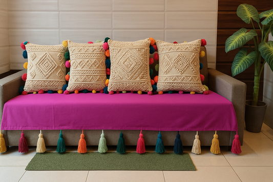 Purple sofa cover with jumbo rainbow tassel