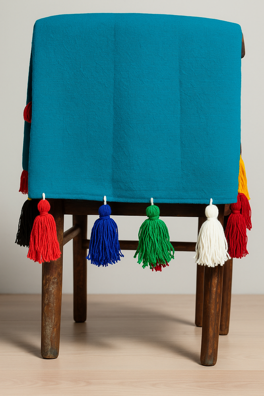 Emerald green chair cover with colourful tassel