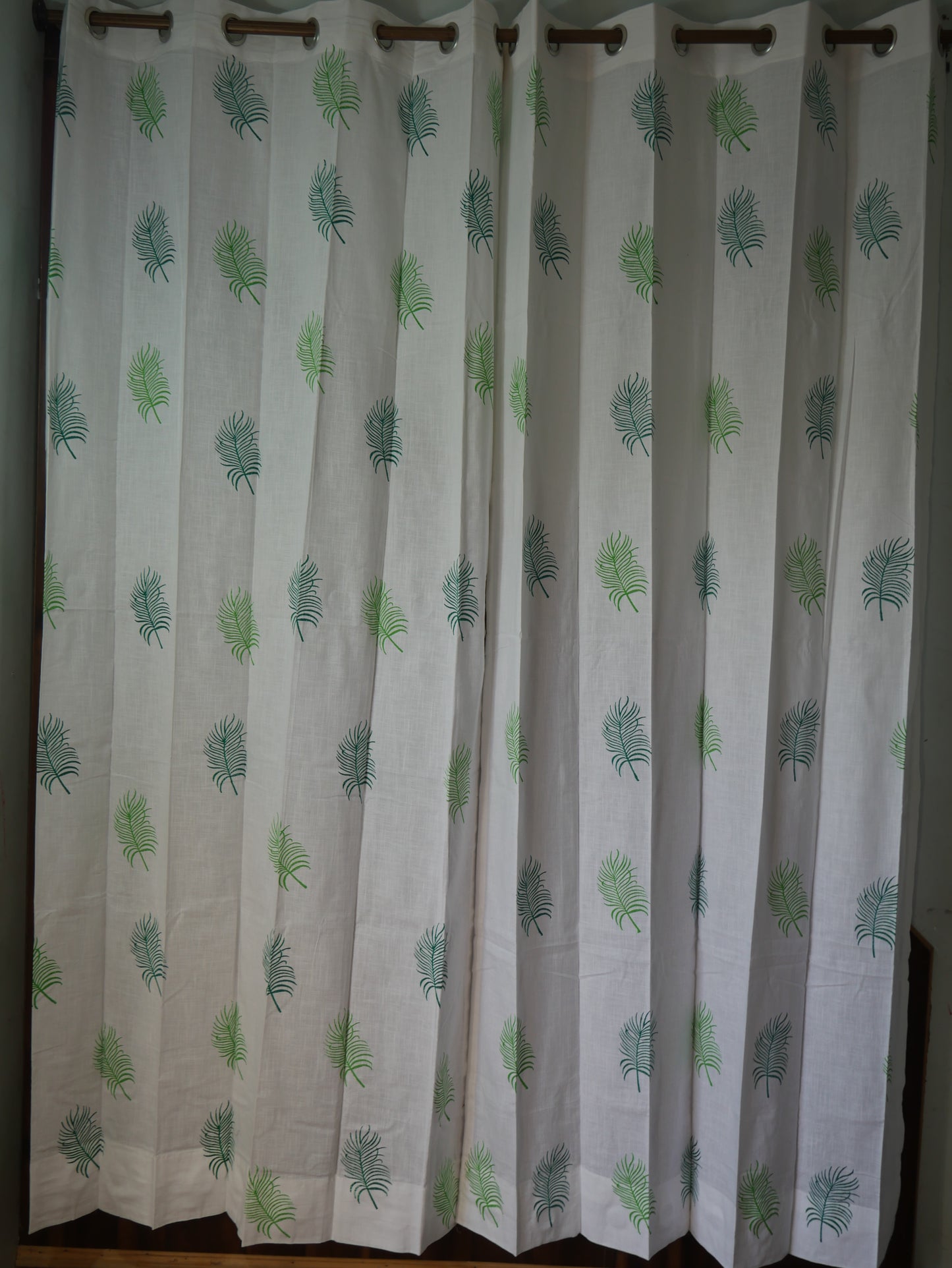 Hand block palm leaves on curtain