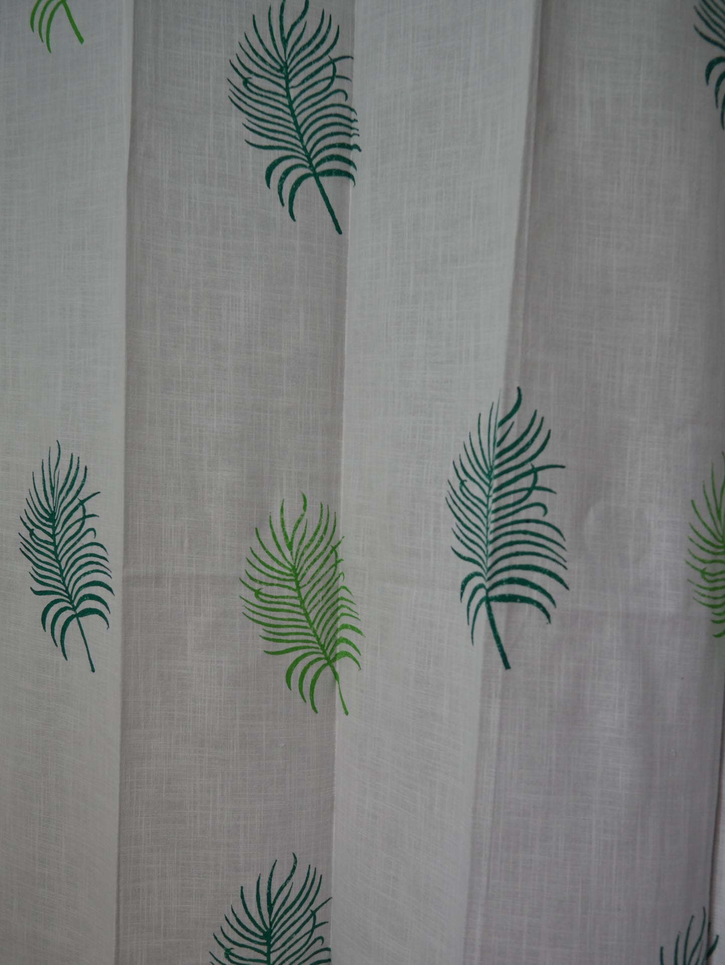 Hand block palm leaves on curtain