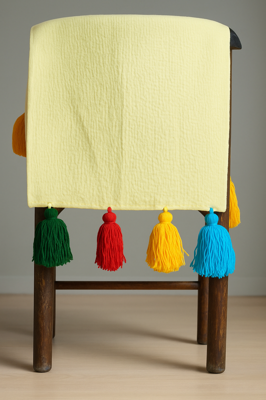 Lemon yellow chair cover with colourful tassel